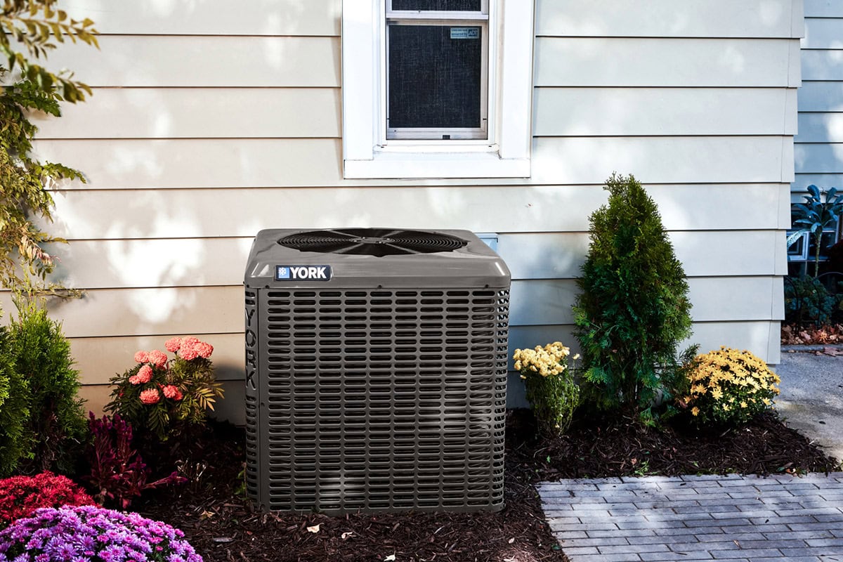 YORK® AC unit outside of a home.